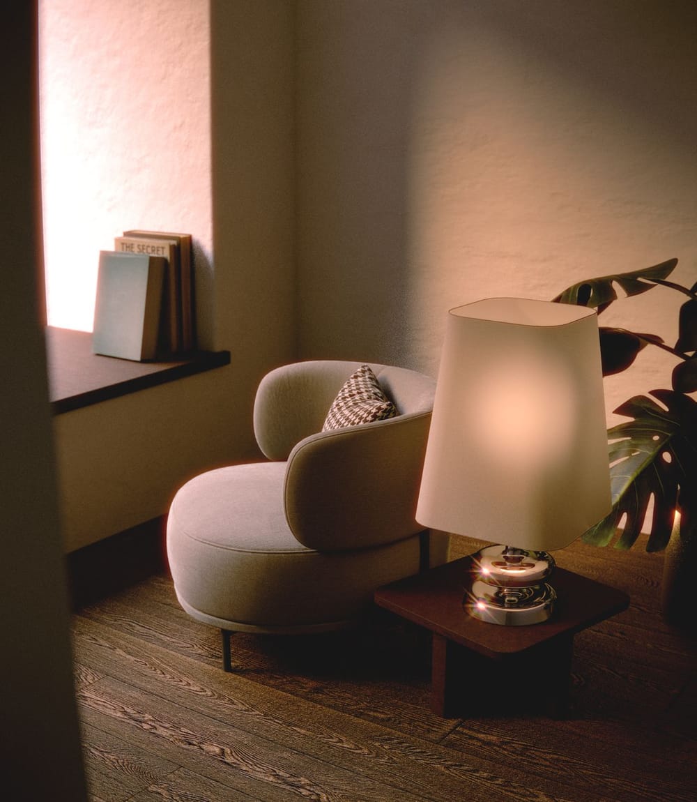 A calm, softly lit corner with a comfortable chair